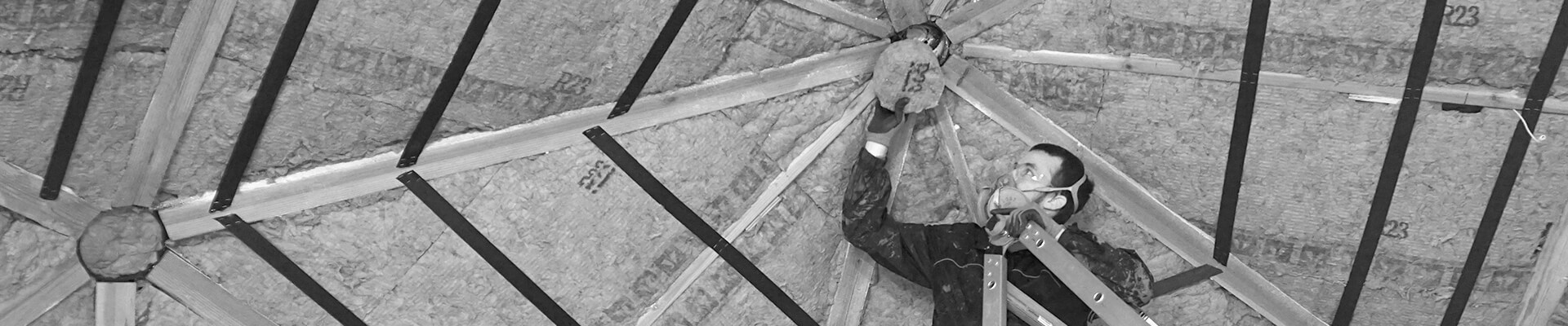 A close-up view of the soft insulation being installed in the Mini Dome in black and white.