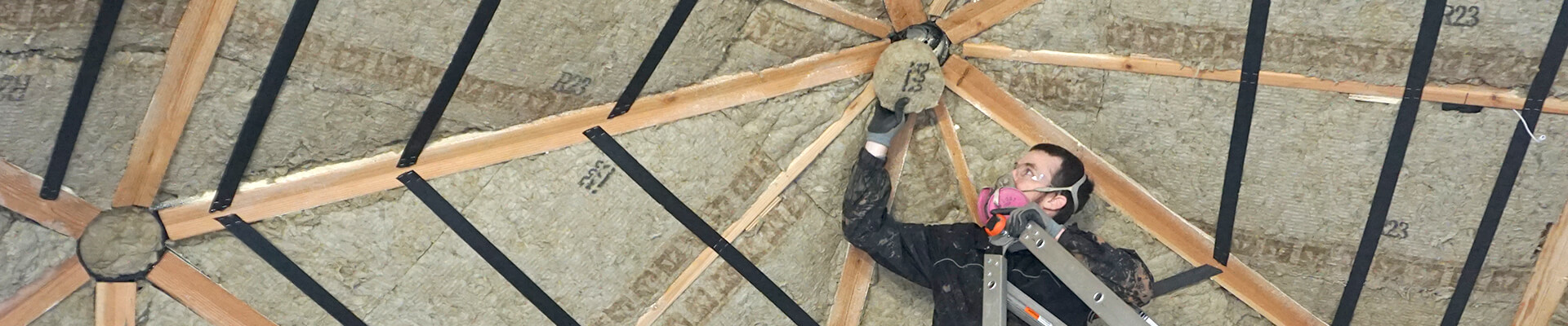 A close-up view of the soft insulation being installed in the Mini Dome.