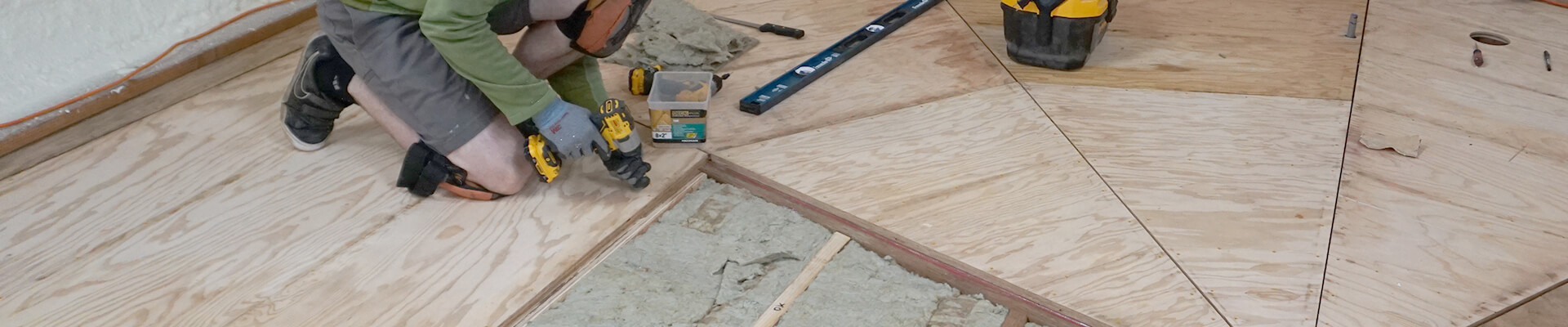 A close-up view of the subfloor being installed in the Mini Dome.